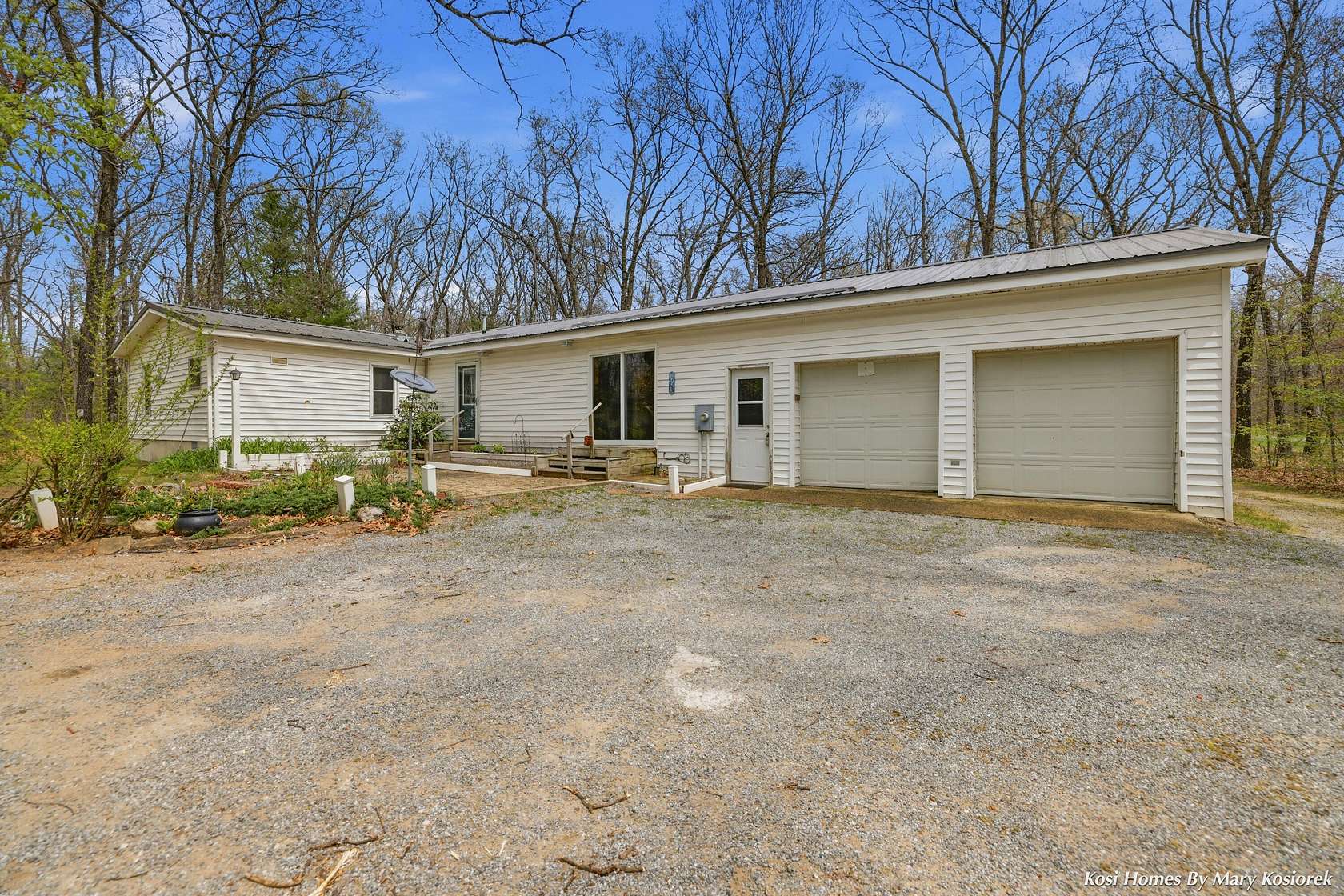 2.5 Acres of Land with Home for Sale in Grant, Michigan