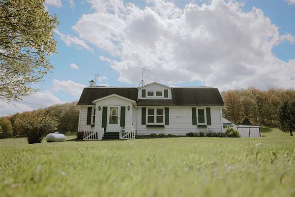 13 Acres of Land with Home for Sale in Corry, Pennsylvania