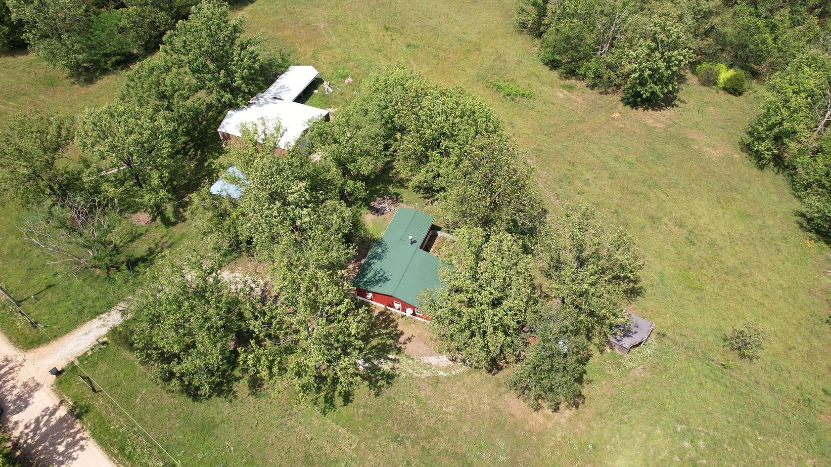 29.8 Acres of Land with Home for Sale in Conway, Missouri