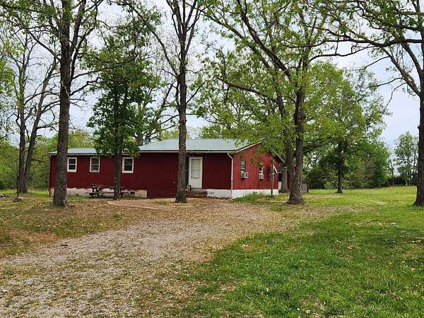 29.8 Acres of Land with Home for Sale in Conway, Missouri