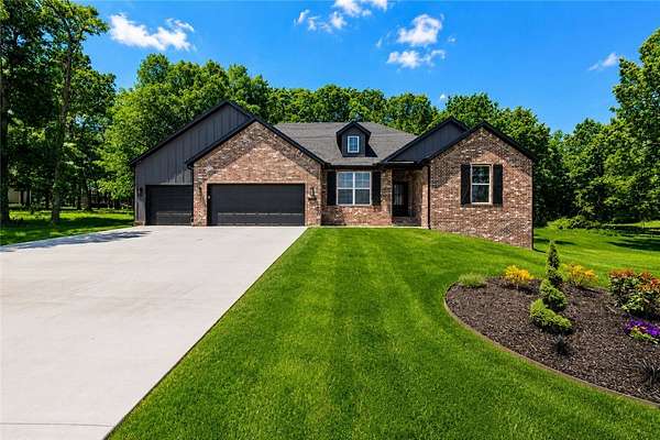 1.5 Acres of Land with Home for Sale in Gentry, Arkansas