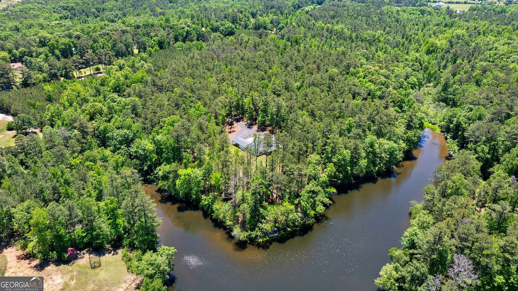 10.6 Acres of Recreational Land with Home for Sale in Newnan, Georgia