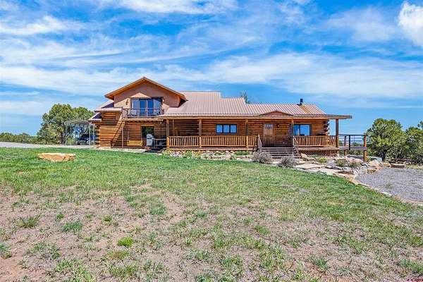 40 Acres of Land with Home for Sale in Montrose, Colorado