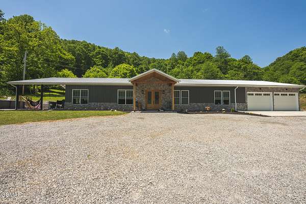 49.4 Acres of Land with Home for Sale in Speedwell, Tennessee