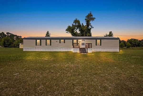5 Acres of Land with Home for Sale in Chiefland, Florida