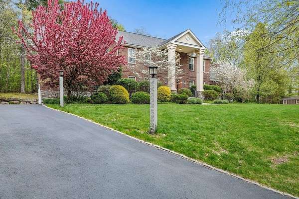 1.75 Acres of Land with Home for Sale in Bedford, New Hampshire