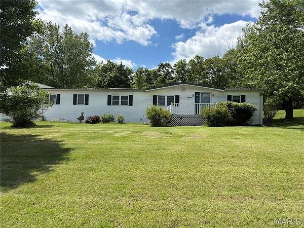 13.6 Acres of Land with Home for Sale in Linn, Missouri
