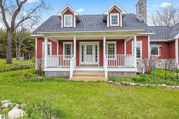 10.3 Acres of Land with Home for Sale in Bellaire, Michigan