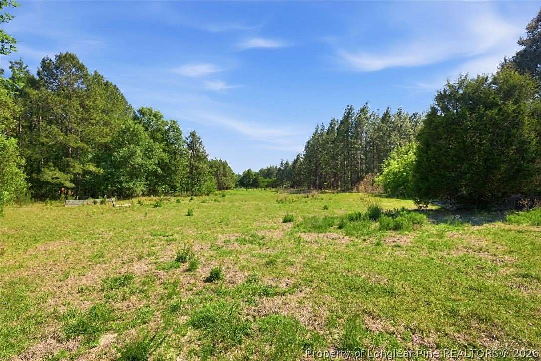 11.6 Acres of Land with Home for Sale in Aberdeen, North Carolina