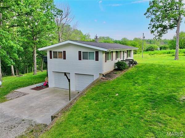 4.9 Acres of Land with Home for Sale in Boonville, Missouri