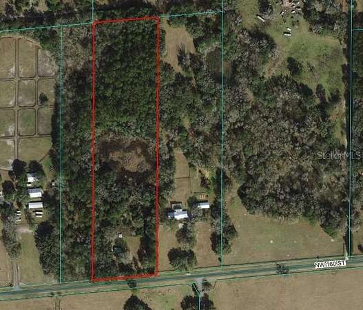 10 Acres of Land with Home for Sale in Reddick, Florida
