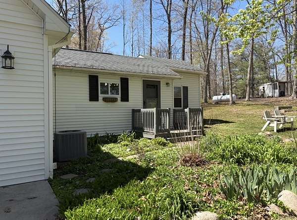 10 Acres of Recreational Land with Home for Sale in Harrison, Michigan