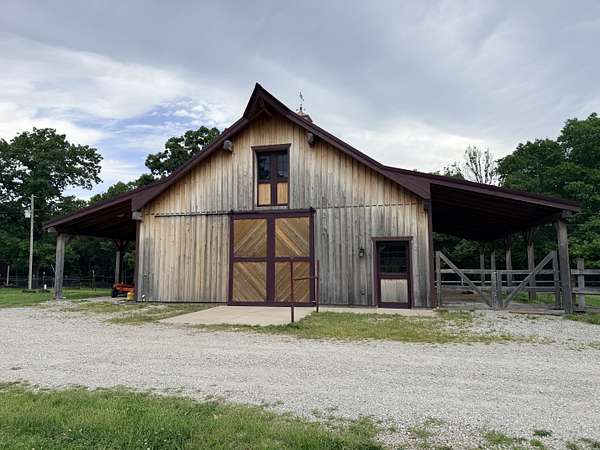 23.5 Acres of Agricultural Land with Home for Sale in Cole Camp, Missouri