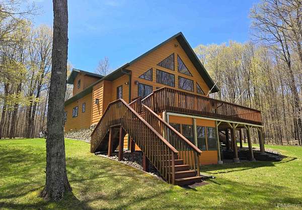 12.8 Acres of Land with Home for Sale in Iron River, Michigan