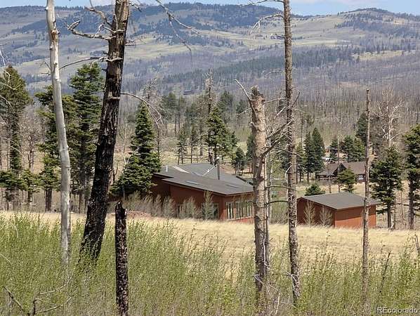 4.9 Acres of Land with Home for Sale in Fort Garland, Colorado