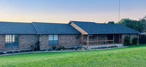 4.1 Acres of Land with Home for Lease in Thorndale, Texas