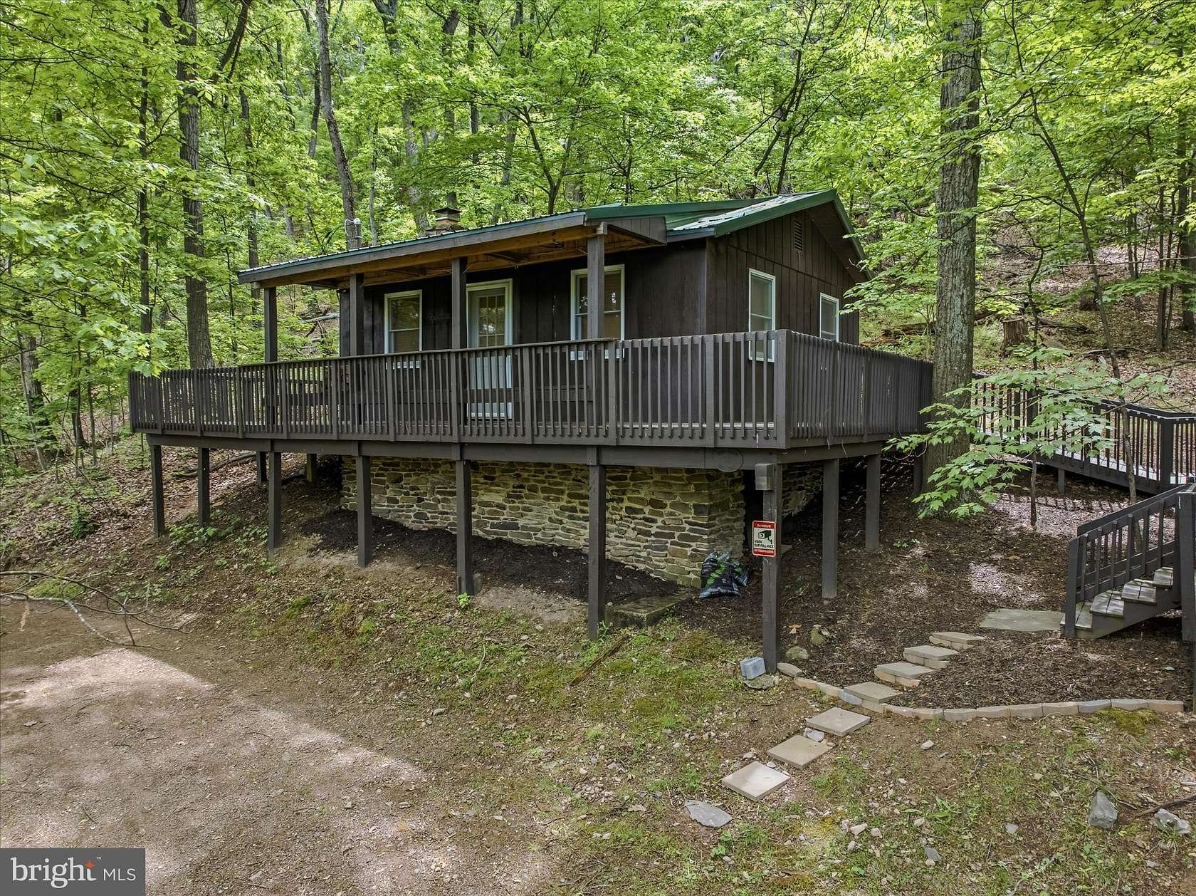 27.1 Acres of Recreational Land with Home for Sale in Berkeley Springs, West Virginia