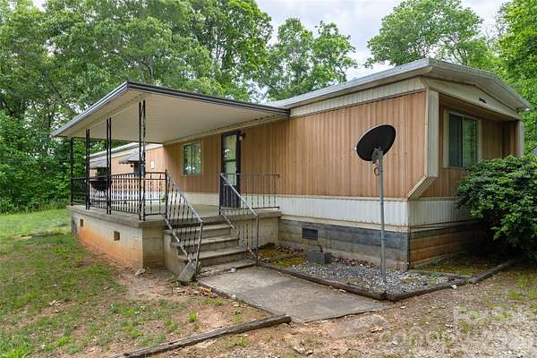 9 Acres of Land with Home for Sale in Candler, North Carolina