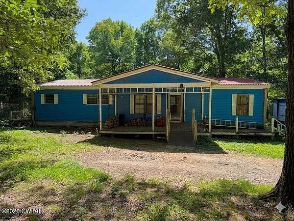 7.1 Acres of Land with Home for Sale in Trenton, Tennessee