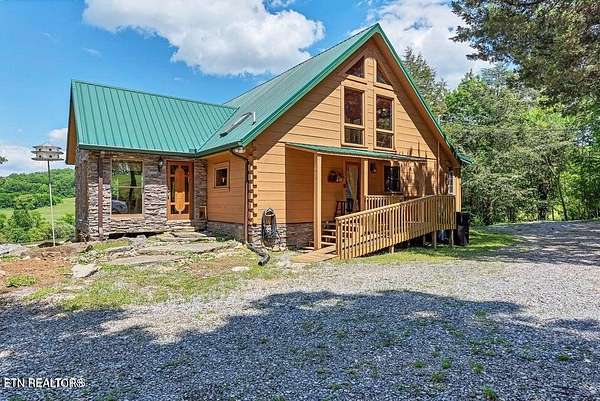 7.47 Acres of Land with Home for Sale in Louisville, Tennessee