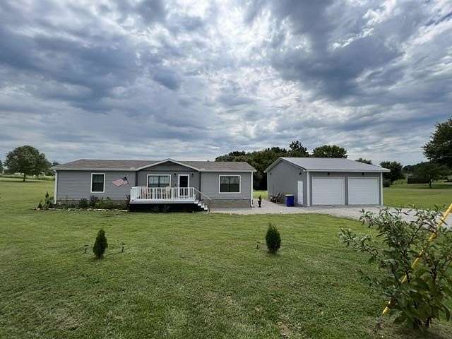 9.86 Acres of Land with Home for Sale in Glasgow, Kentucky