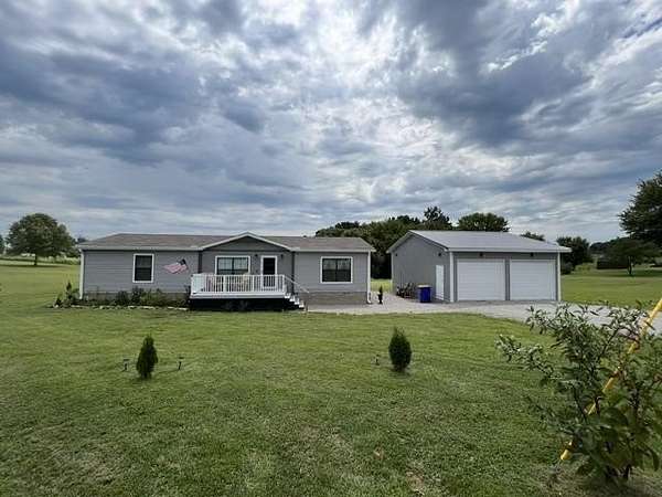 9.86 Acres of Land with Home for Sale in Glasgow, Kentucky