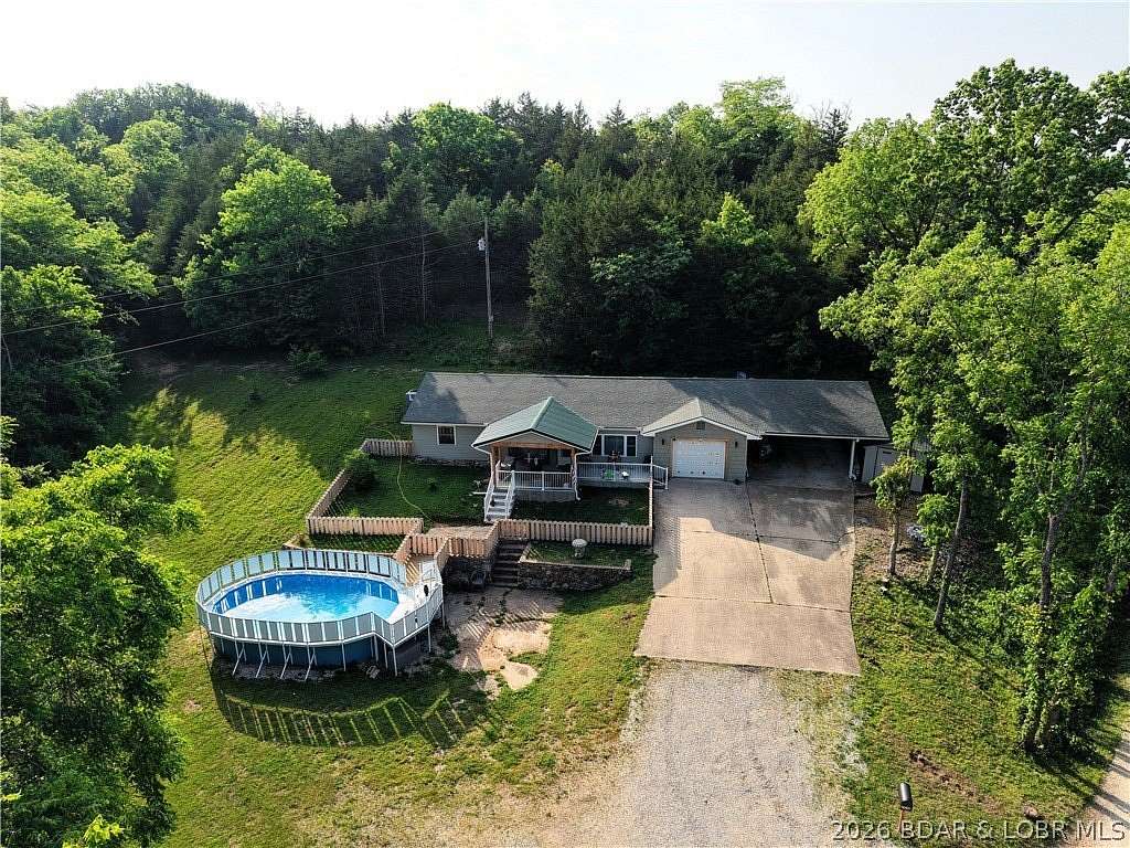 4.55 Acres of Land with Home for Sale in Versailles, Missouri