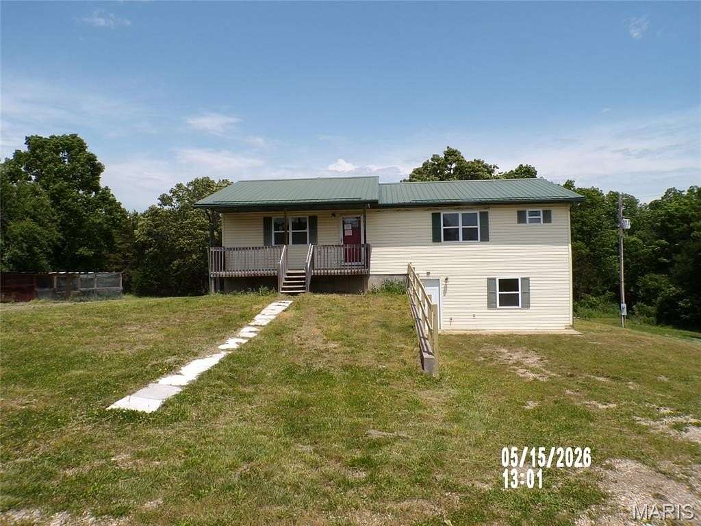 1.79 Acres of Land with Home for Sale in Richland, Missouri