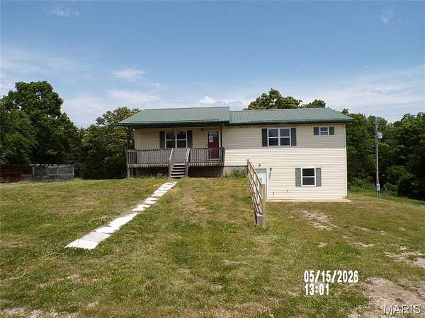 1.79 Acres of Land with Home for Sale in Richland, Missouri