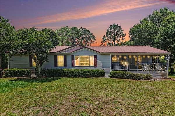 5.27 Acres of Land with Home for Sale in St. Cloud, Florida