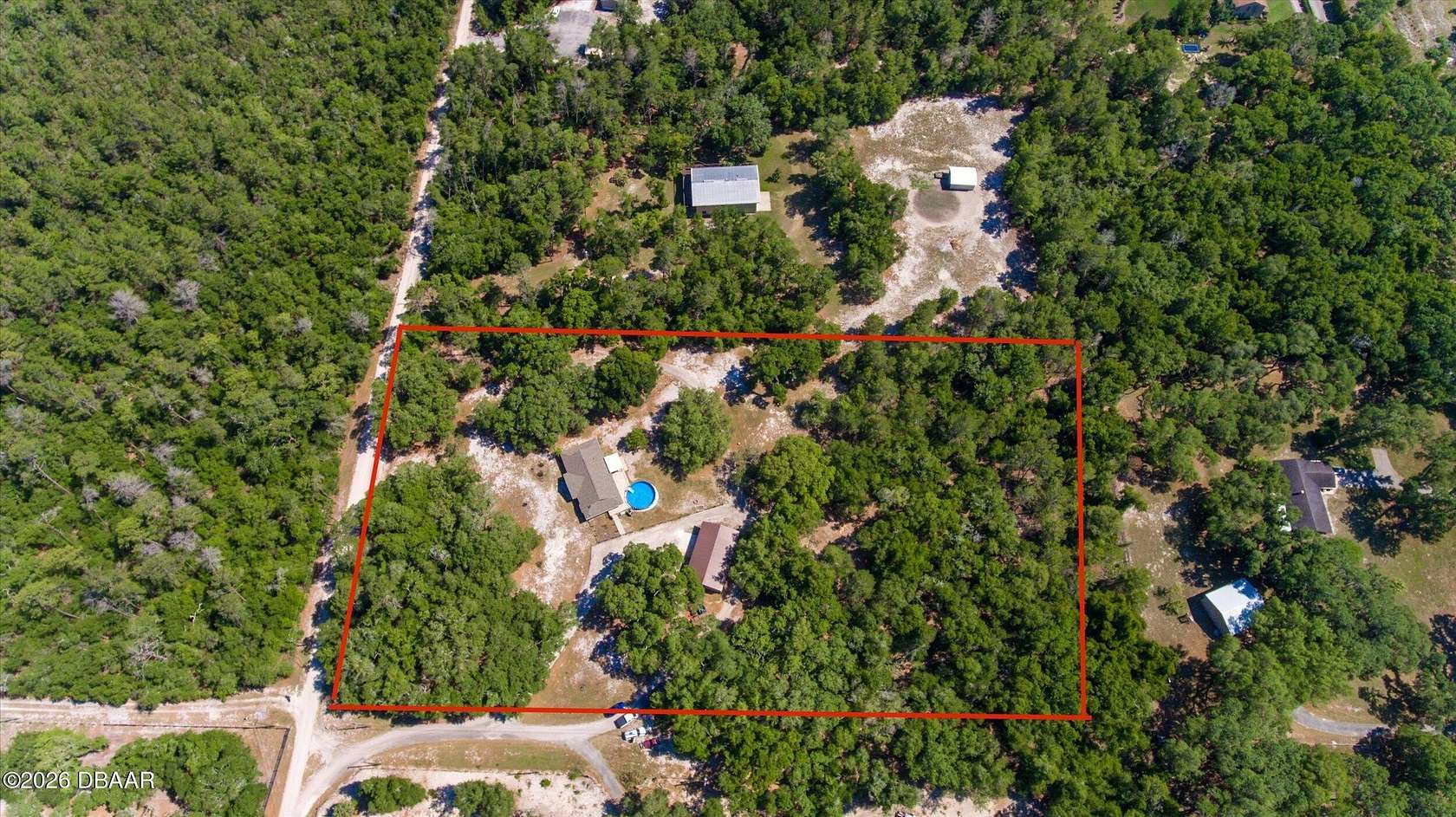 5 Acres of Land with Home for Sale in De Leon Springs, Florida