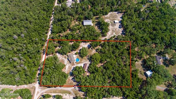 5 Acres of Land with Home for Sale in De Leon Springs, Florida
