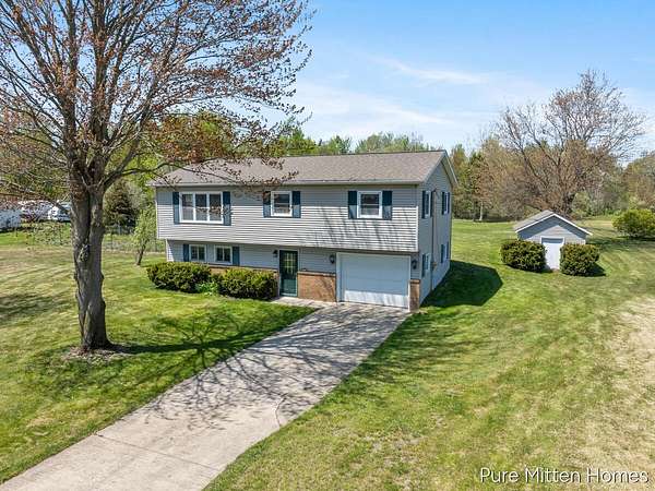 2.55 Acres of Land with Home for Sale in Twin Lake, Michigan
