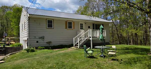 4 Acres of Land with Home for Sale in Dexter, Maine