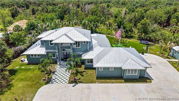 4.9 Acres of Land with Home for Sale in Palm City, Florida