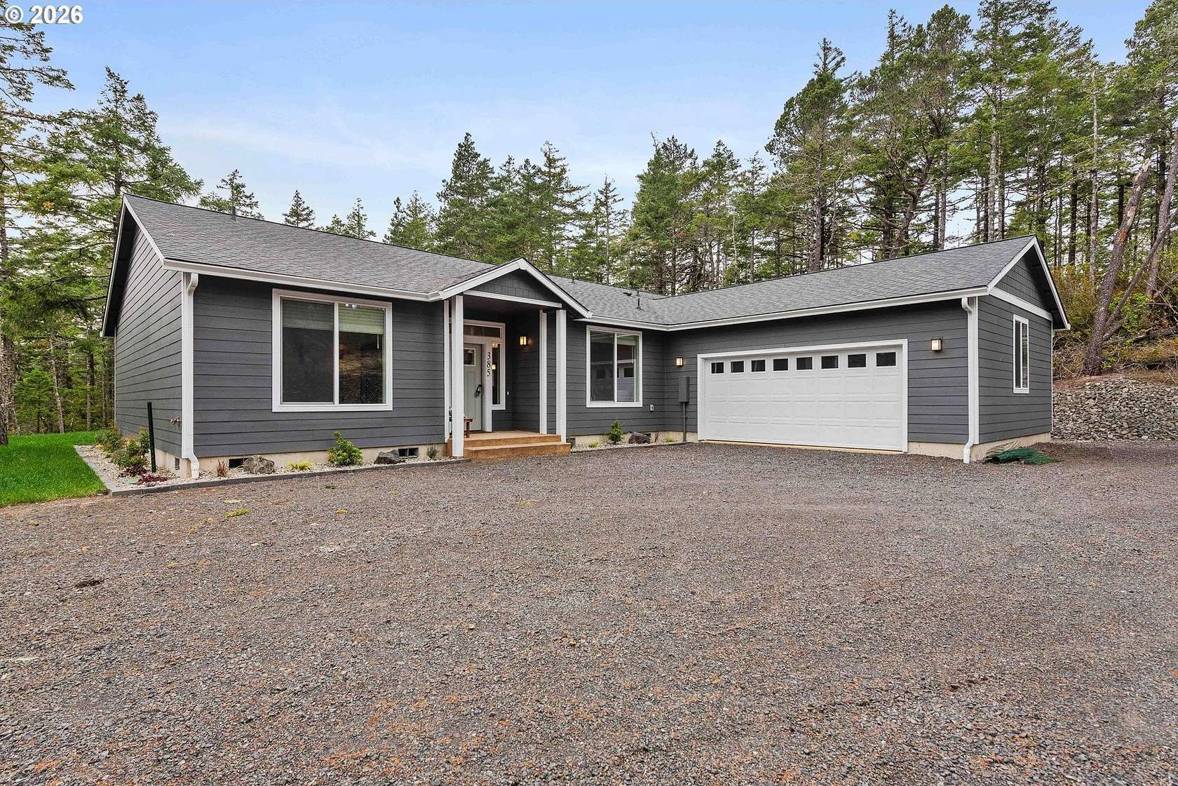 5 Acres of Land with Home for Sale in North Bend, Oregon