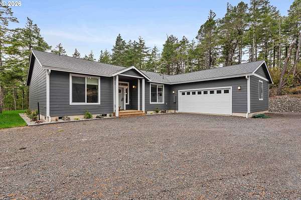 5 Acres of Land with Home for Sale in North Bend, Oregon