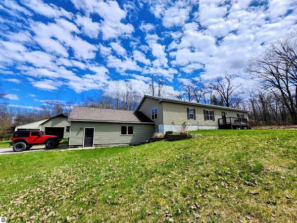 2 Acres of Land with Home for Sale in Atlanta, Michigan