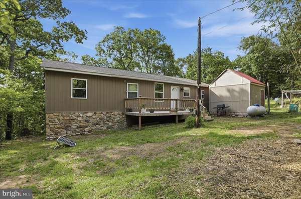 5 Acres of Land with Home for Sale in Great Cacapon, West Virginia