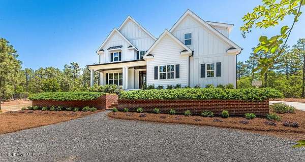 5.3 Acres of Land with Home for Sale in West End, North Carolina