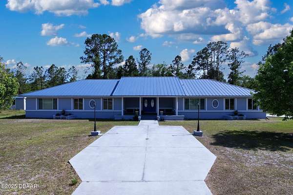 2.16 Acres of Land with Home for Sale in San Mateo, Florida