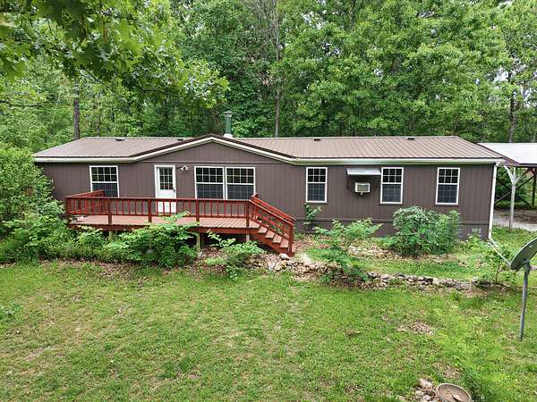 9.19 Acres of Land with Home for Sale in Niangua, Missouri
