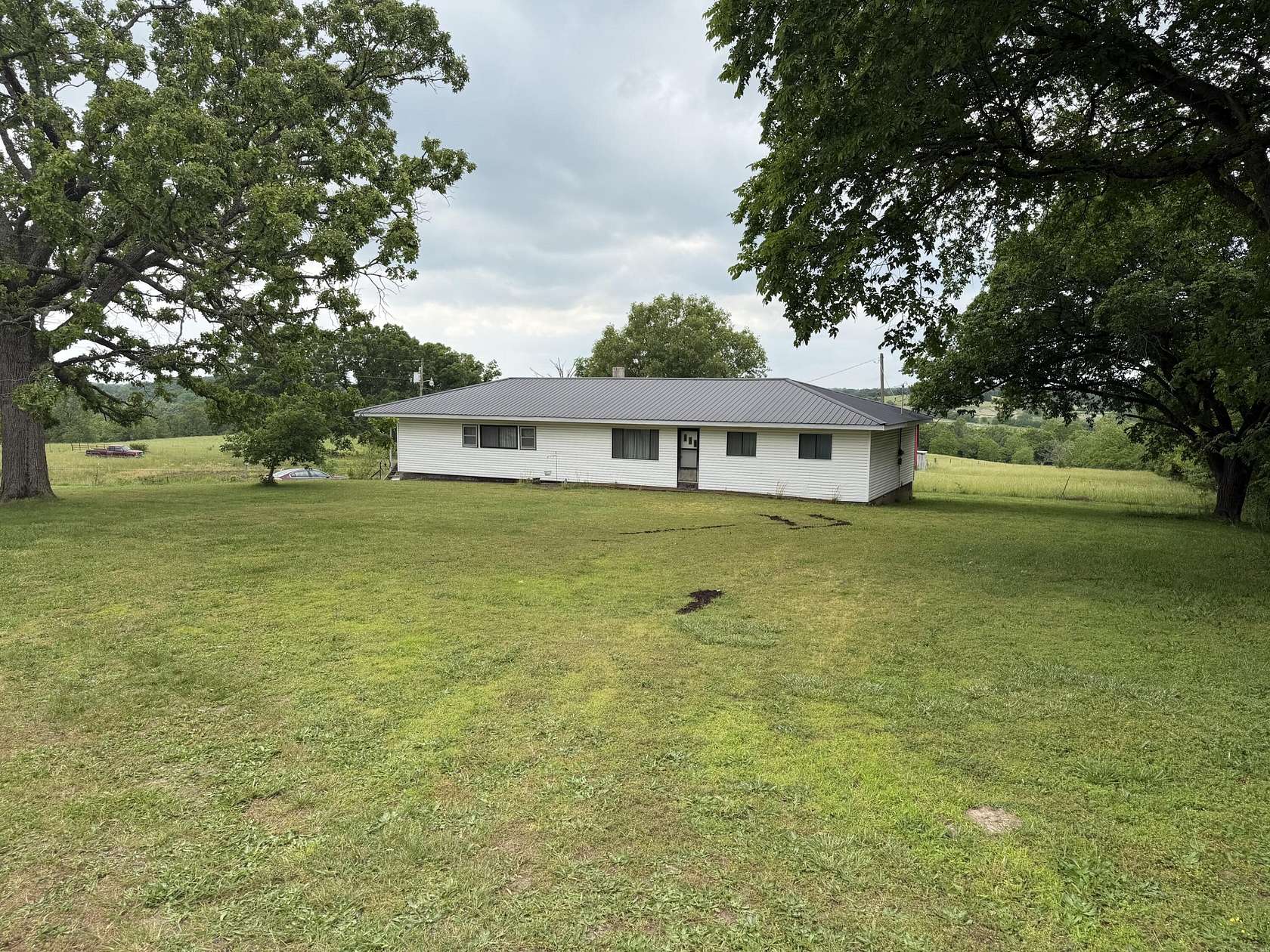 34 Acres of Recreational Land with Home for Sale in Buffalo, Missouri