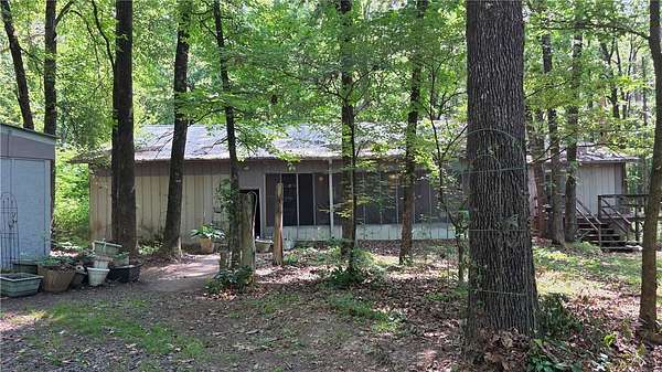 10 Acres of Land with Home for Sale in Belleville, Arkansas