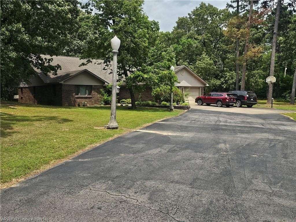 7.26 Acres of Land with Home for Sale in Paris, Arkansas