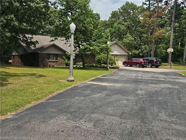 7.26 Acres of Land with Home for Sale in Paris, Arkansas