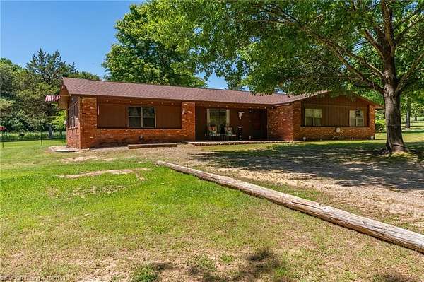 3.15 Acres of Land with Home for Sale in Magazine, Arkansas