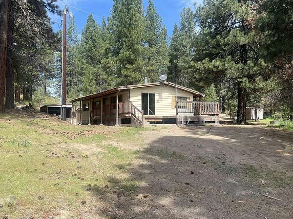 6.62 Acres of Land with Home for Auction in Chiloquin, Oregon