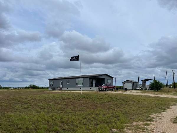 10 Acres of Land with Home for Lease in Floresville, Texas
