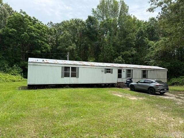 5.4 Acres of Land with Home for Sale in Junction City, Arkansas
